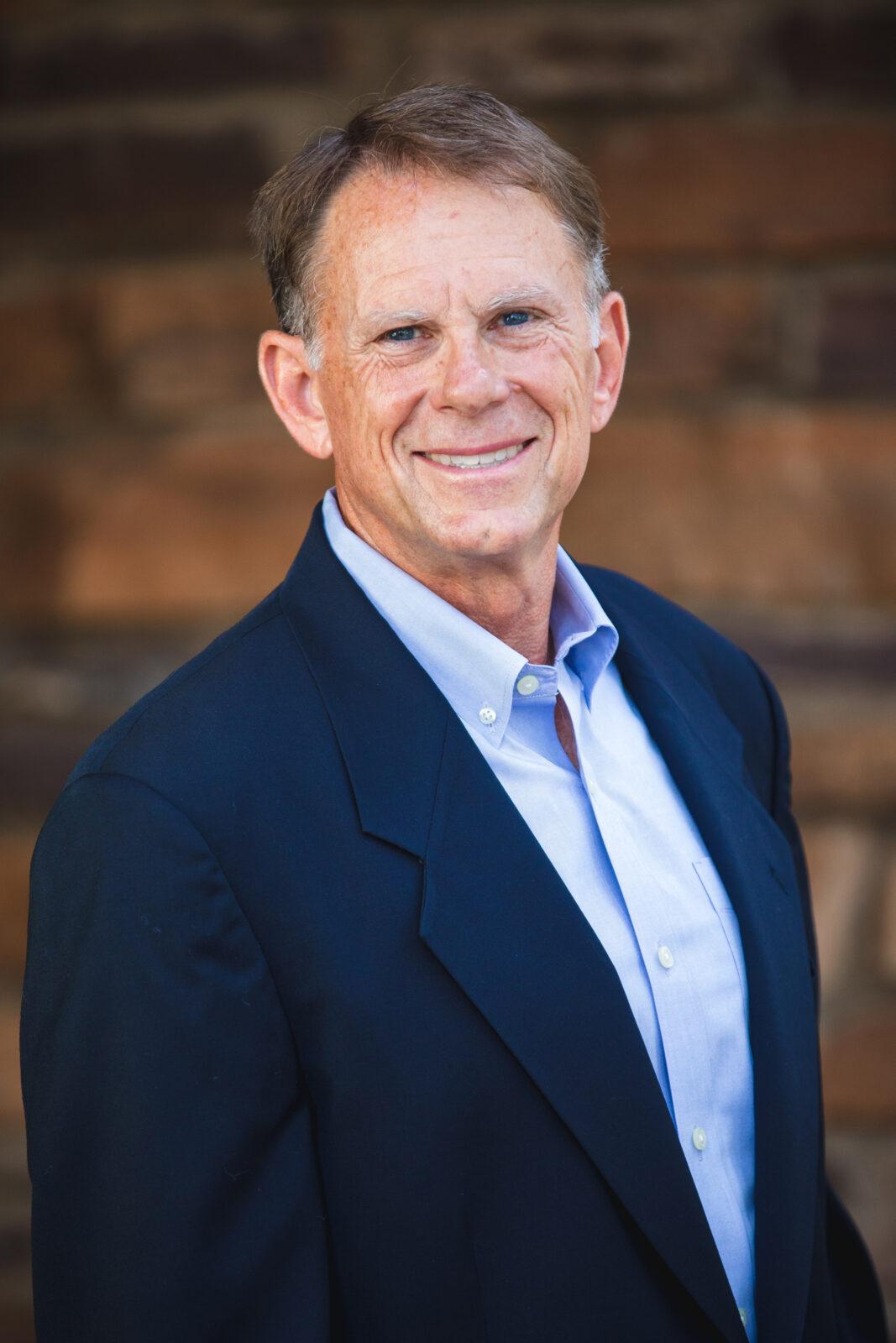 Designated Broker and President Deems Dickinson of Russ